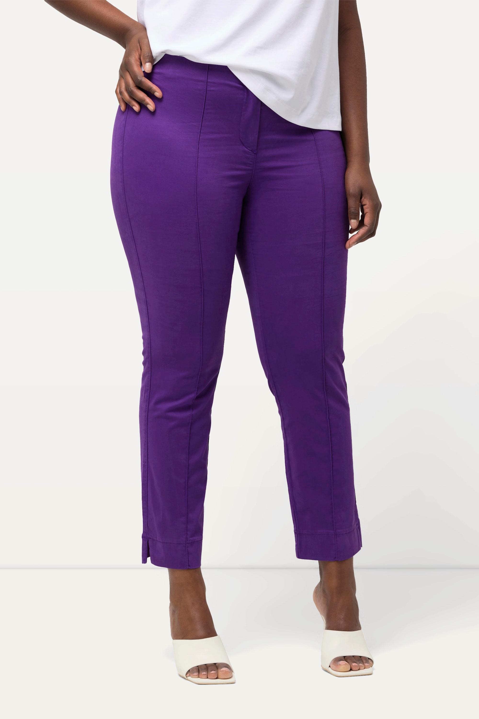 Ulla Popken  Pantalon avec passepoil et taille élastique. Coupe ajustée avec fente sur le bas de jambe. 