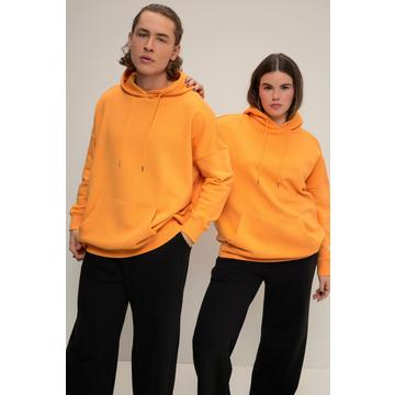 Sweat à capuche oversized. Imprimé dans le dos, poche kangourou. Unisexe