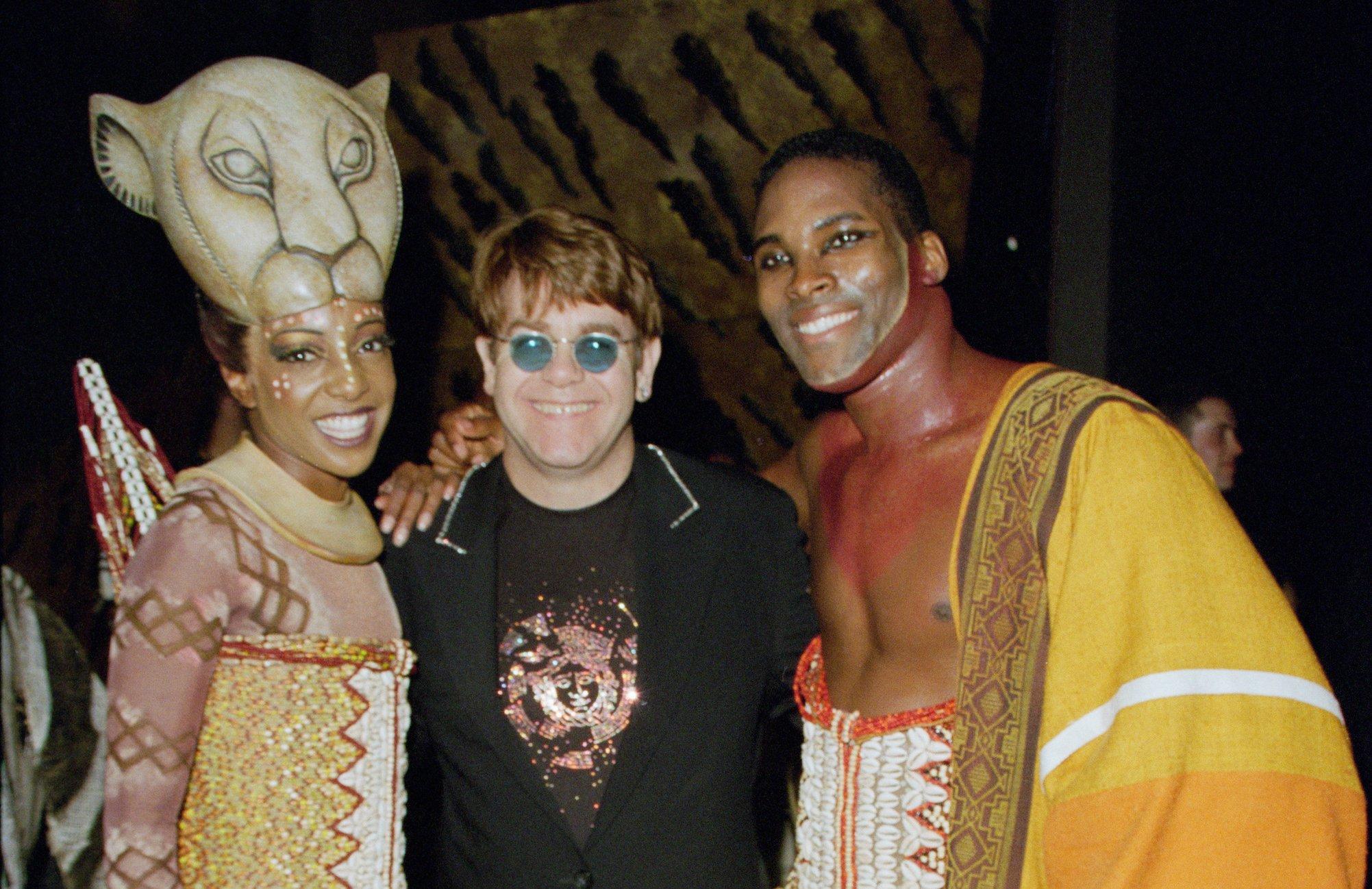 Elton John with Lion King Broadway cast in 1999