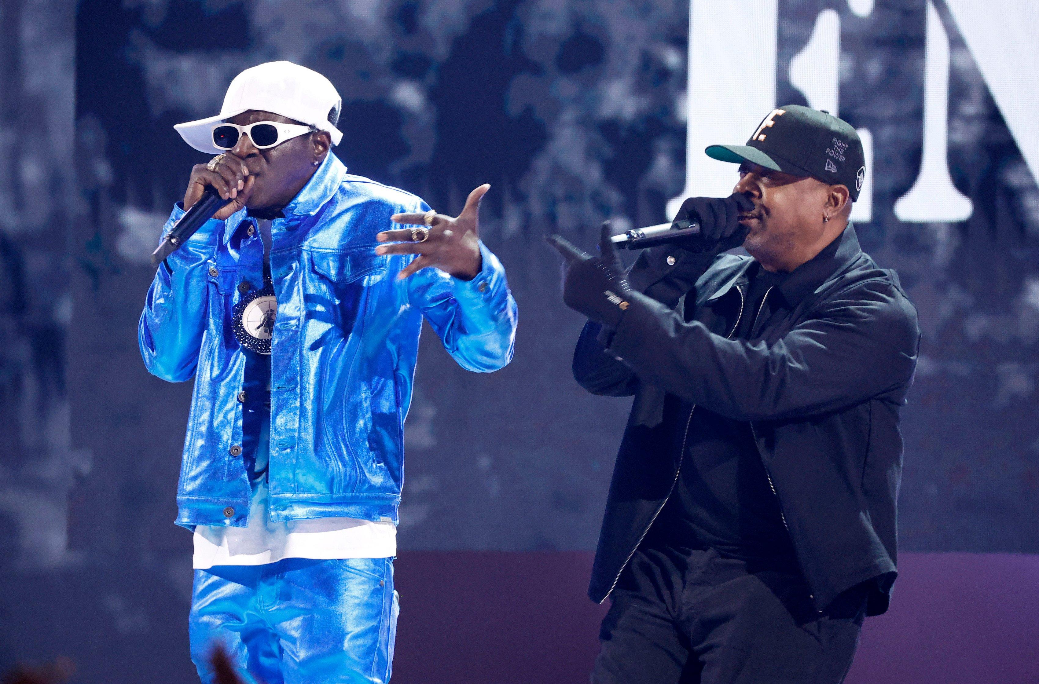 Photo of Flavor Flav and Chuck D of Public Enemy performing during the ceremony's hip-hop tribute.