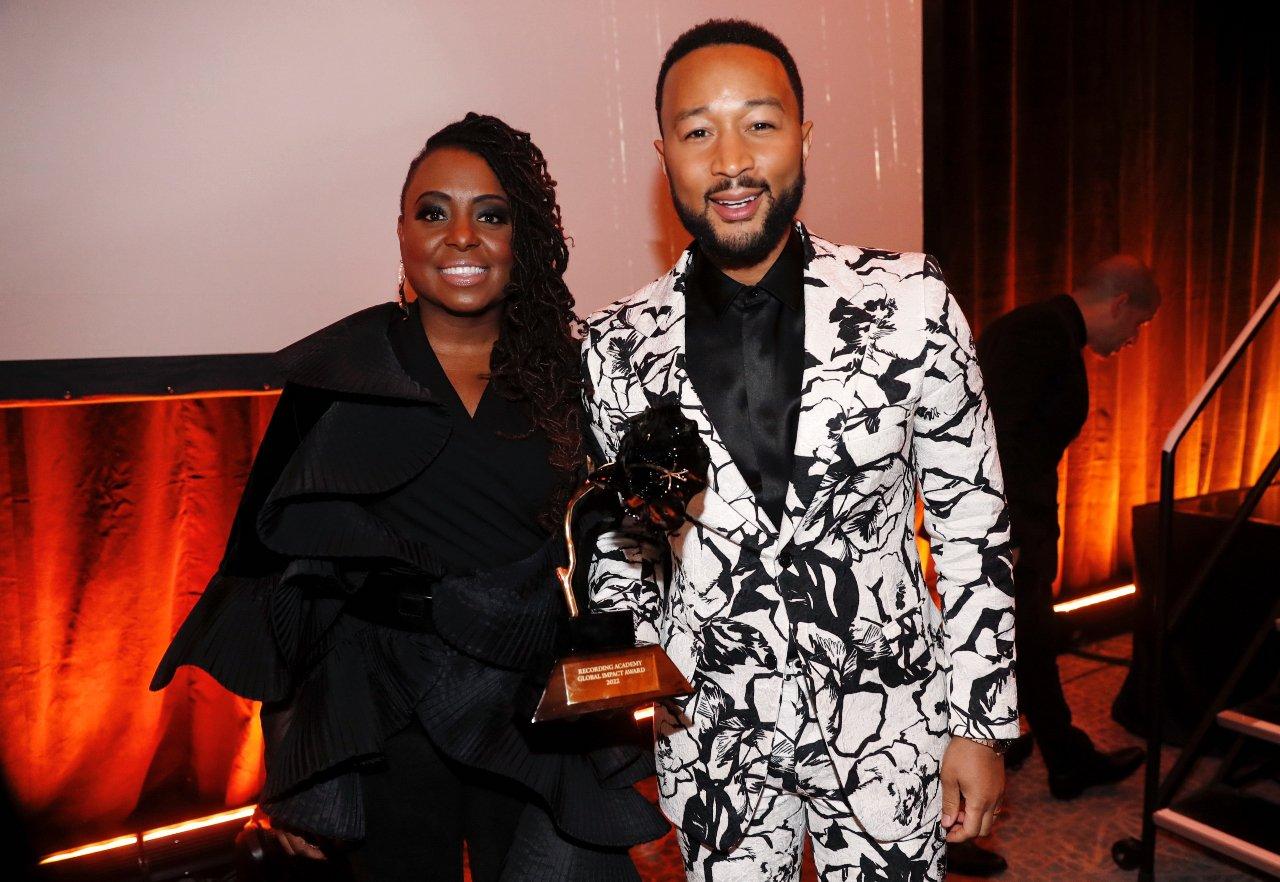 Ledisi and honoree John Legend pose with an award during the Recording Academy Honors presented by The Black Music Collective during the 64th Annual GRAMMY Awards on April 02, 2022 in Las Vegas, Nevada.