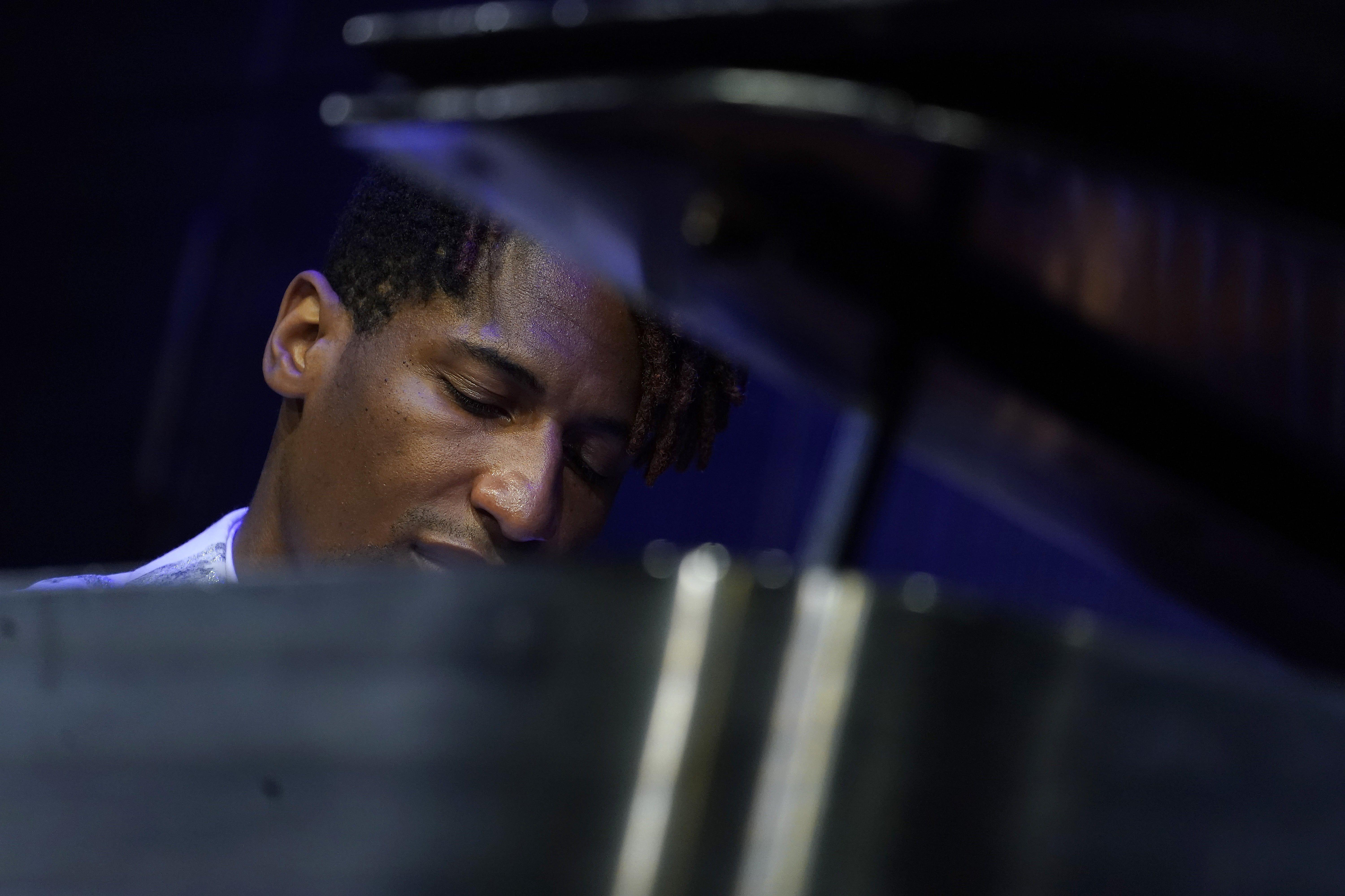 Photo of Jon Batiste performing during the GRAMMY Museum's "A New York Evening with Jon Batiste"