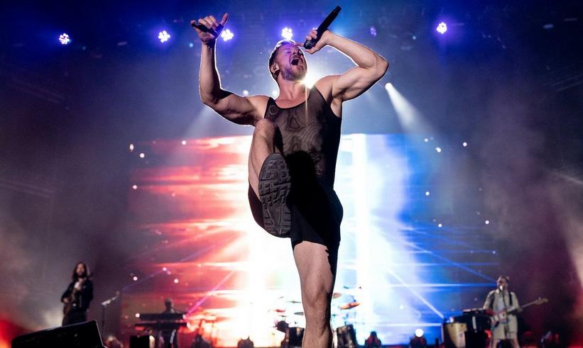 Inside Imagine Dragons' Biggest Hits: Dan Reynolds Details How "Believer," "Radioactive" & More Came To Be
