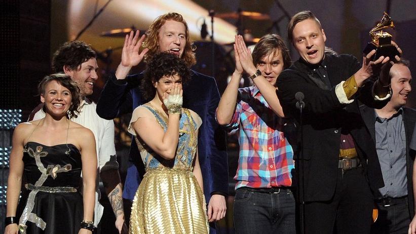 GRAMMY Rewind: Watch Arcade Fire Win Album Of The Year In Disbelief in 2011