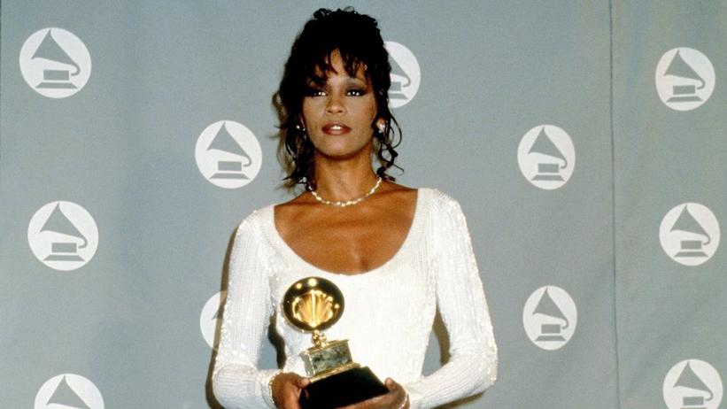 GRAMMY Rewind: Whitney Houston Admires Dolly Parton After "I Will Always Love You" Wins In 1994