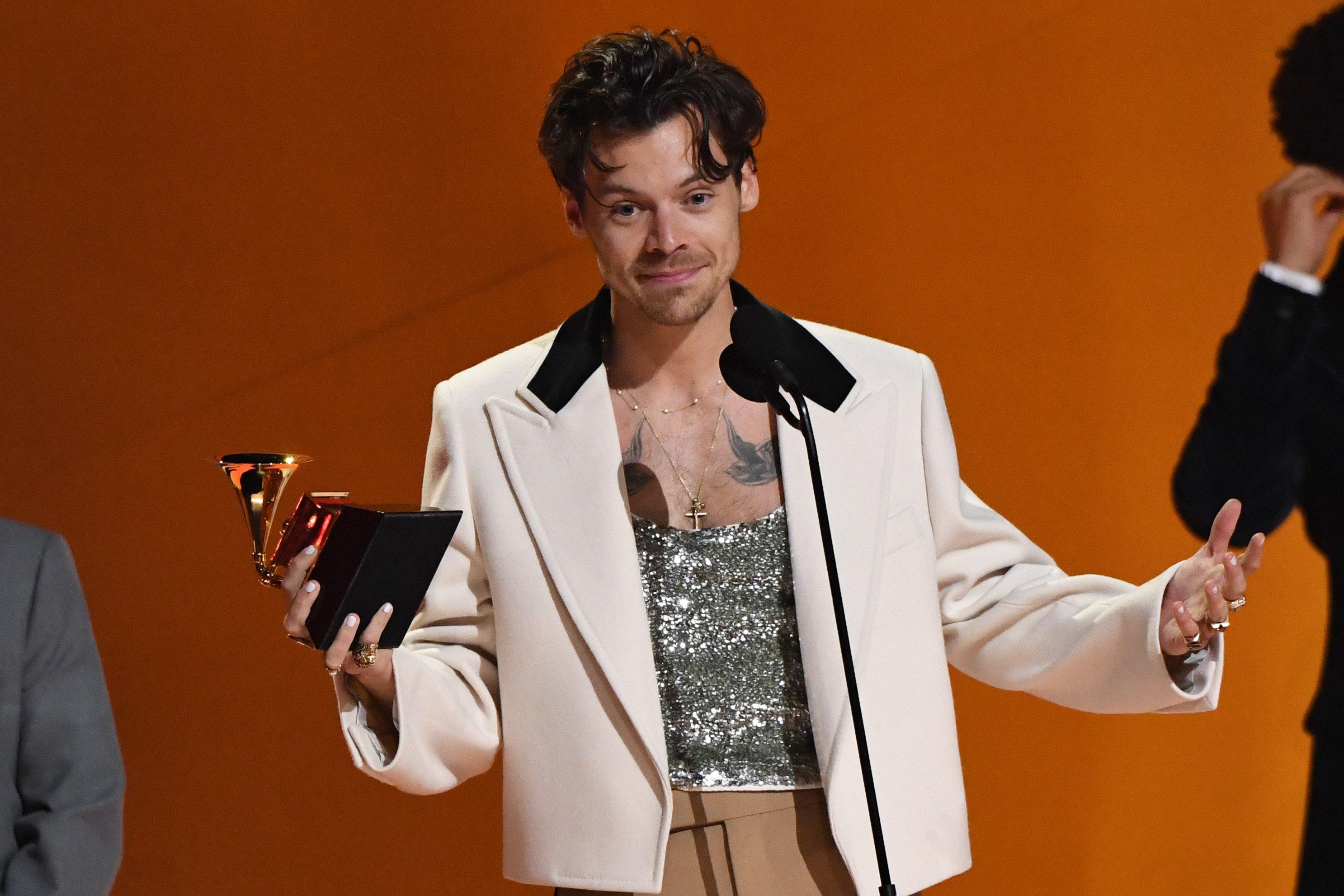 Photo of Harry Styles winning the GRAMMY for Album of the Year at the 2023 GRAMMYs