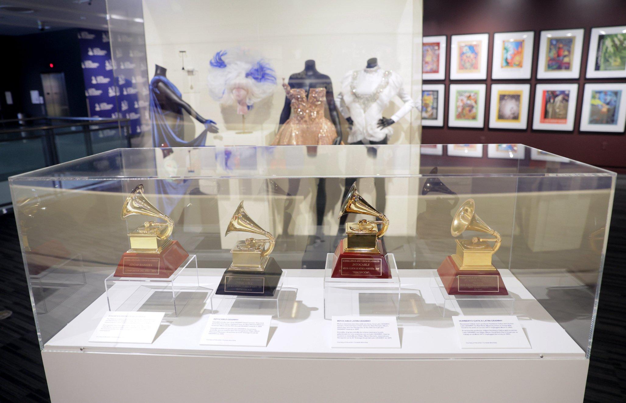 Inside The GRAMMY Museum's Latin GRAMMYs Exhibit Karol G’s History