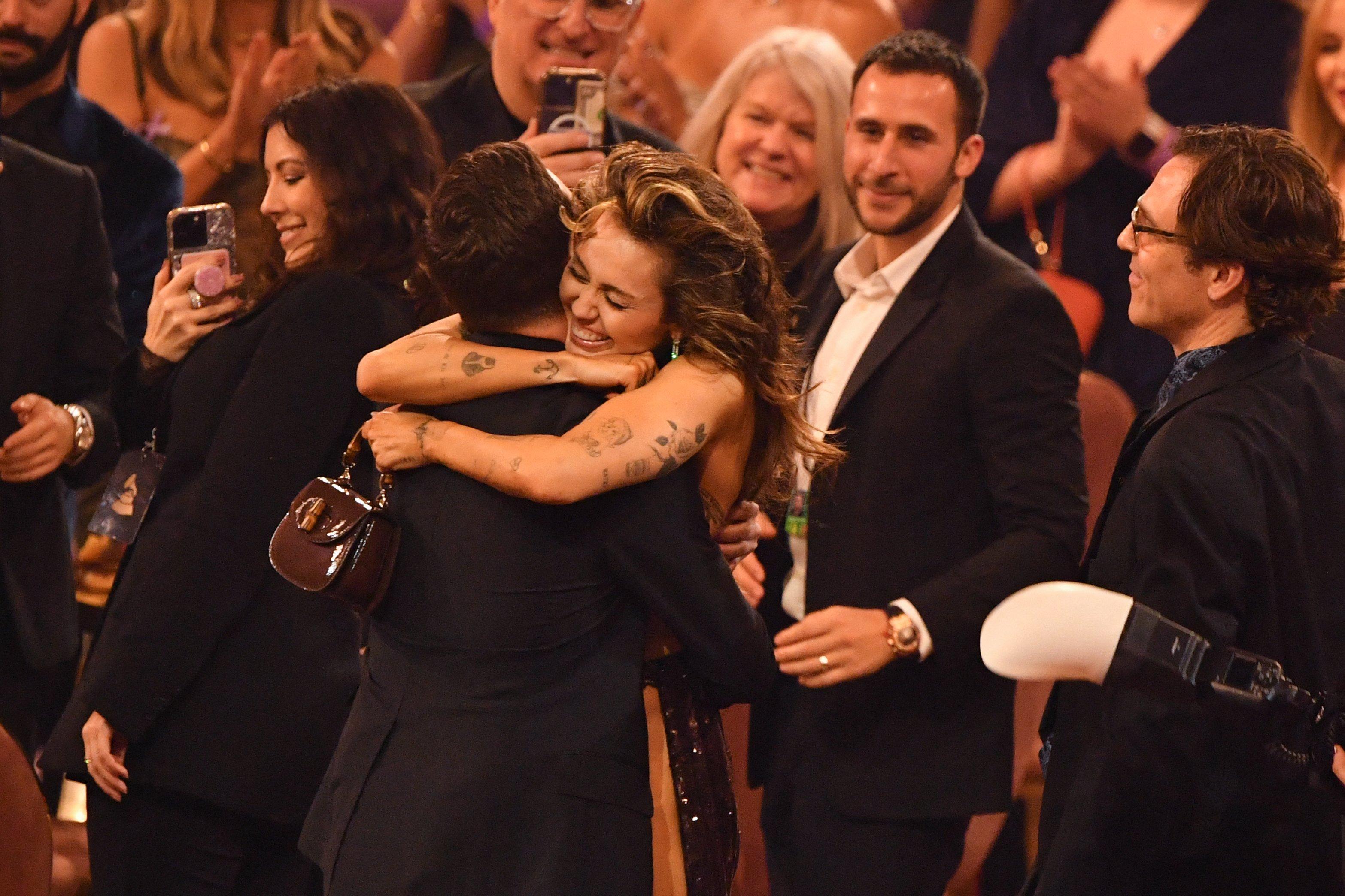 News image for article Taylor Swift Hugs Celine Dion Backstage at 2024 GRAMMYs After Awkward OnStage Interaction  Entertainment Tonight