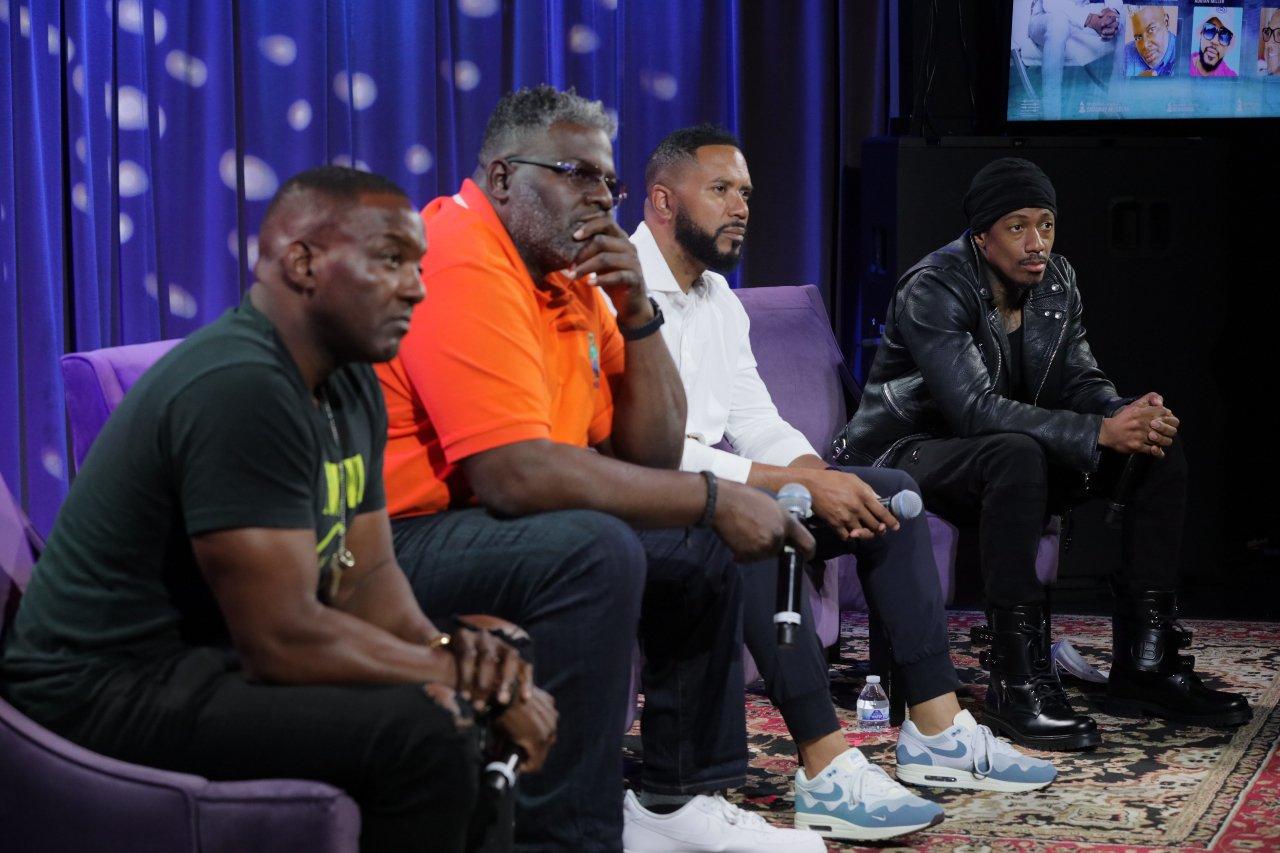 Photo of (L-R) Eric Brooks, Michael “Blue” Williams, Adrian Miller, and Nick Cannon at the "Hip Hop & Mental Health: Facing The Stigma Together" panel at the GRAMMY Museum