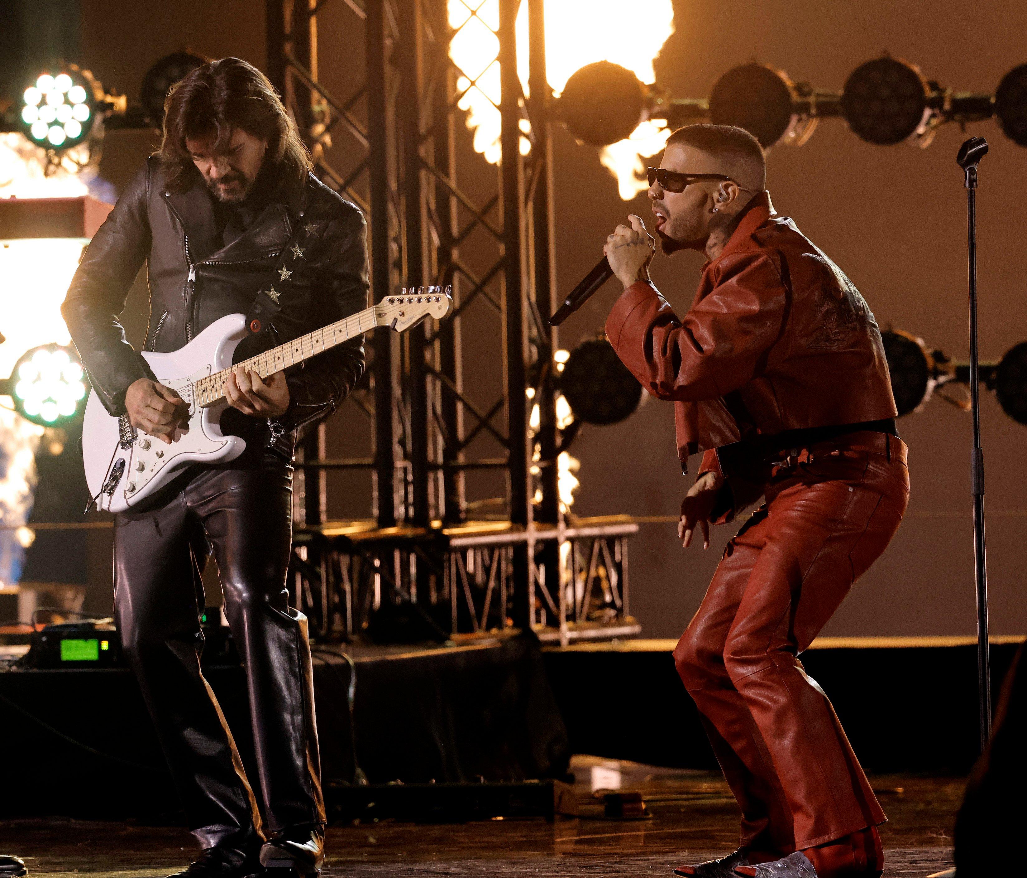 (L-R) Juanes and Rauw Alejandro perform at the 2023 Latin GRAMMYs on Thursday, Nov. 16, 2023, in Seville, Spain