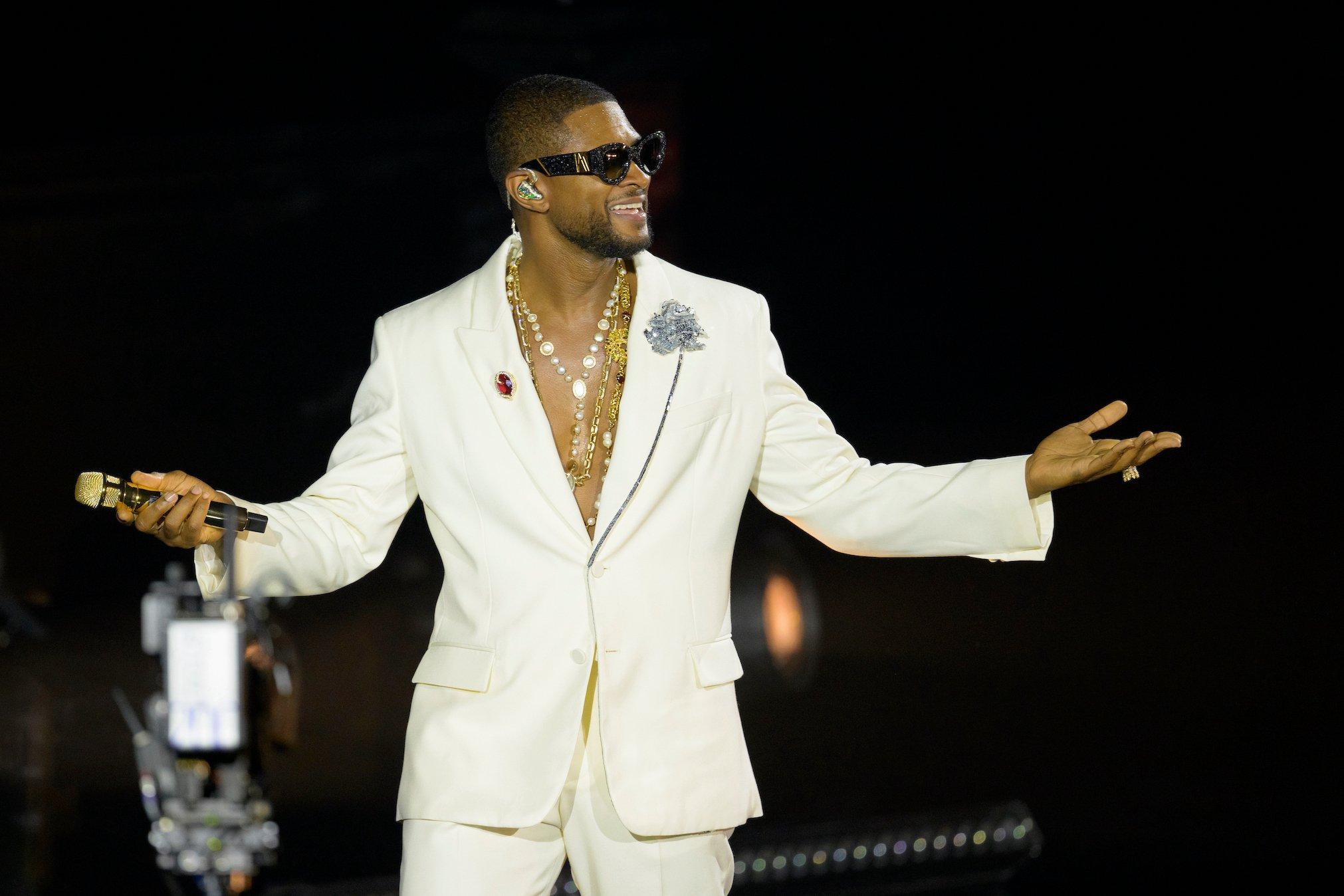 Usher performing in 2023
