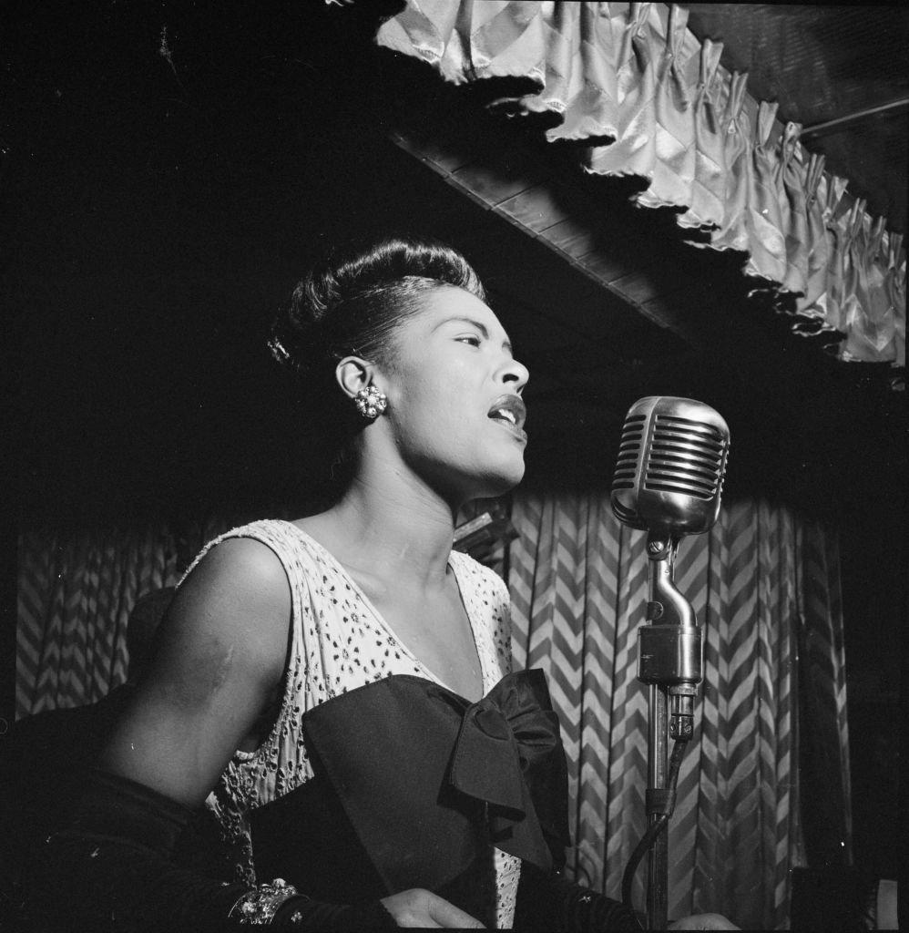 Billie Holiday performing at the Club Downbeat in 1947