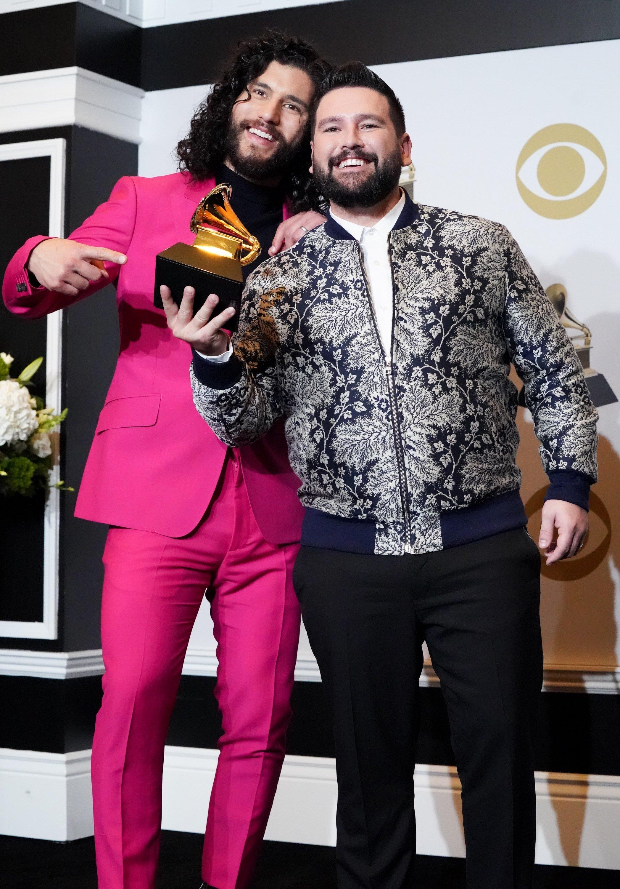 Dan + Shay pose backstage with their GRAMMY at 2020 GRAMMY Awards show