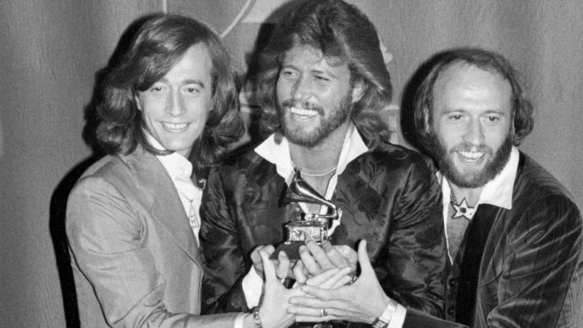 GRAMMY Rewind: Watch The Bee Gees Confidently Win Album Of The Year For 'Saturday Night Fever' In 1979