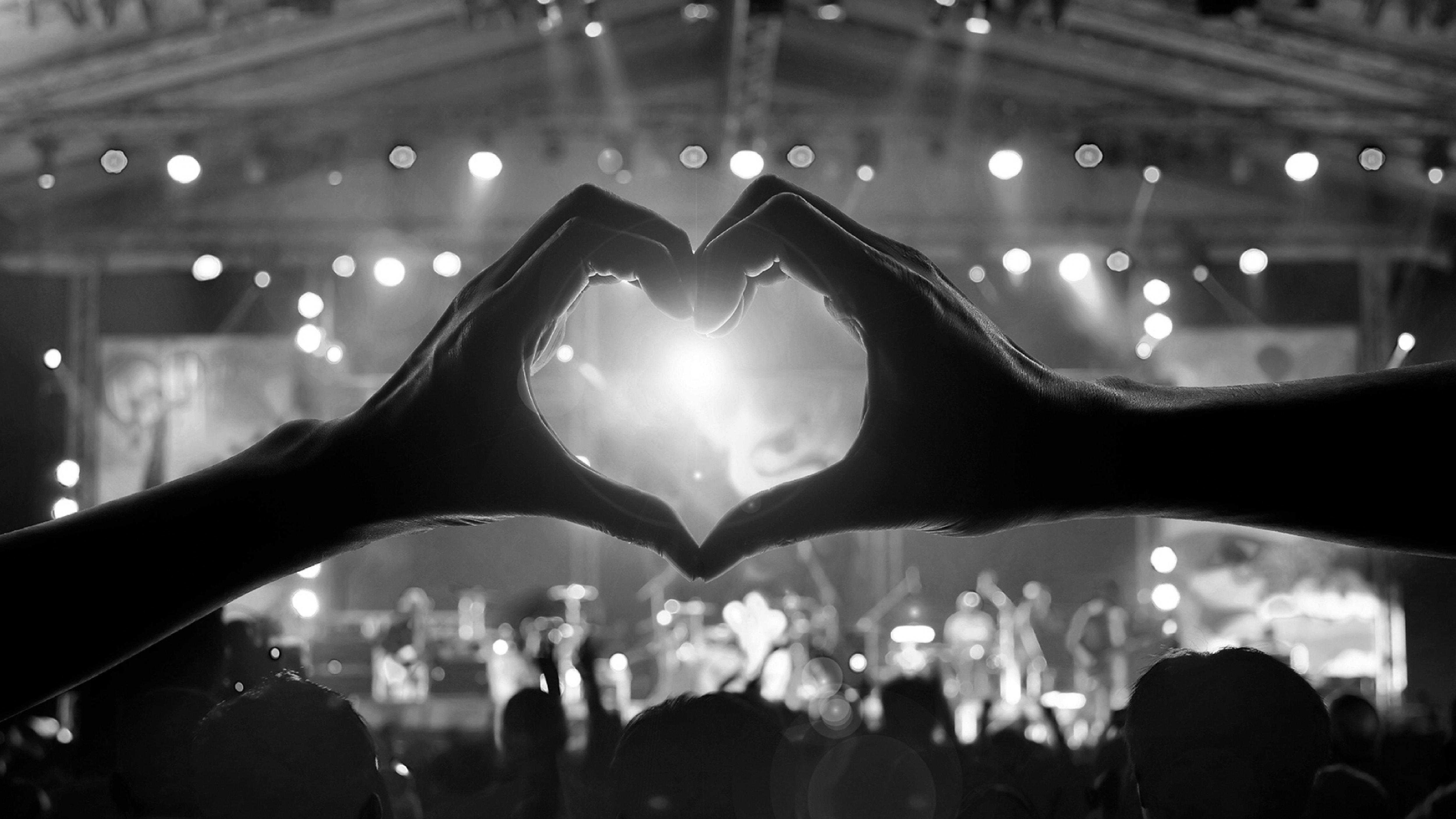 Hands in the shape of a heart representing MusiCares Covid-19 campaign.