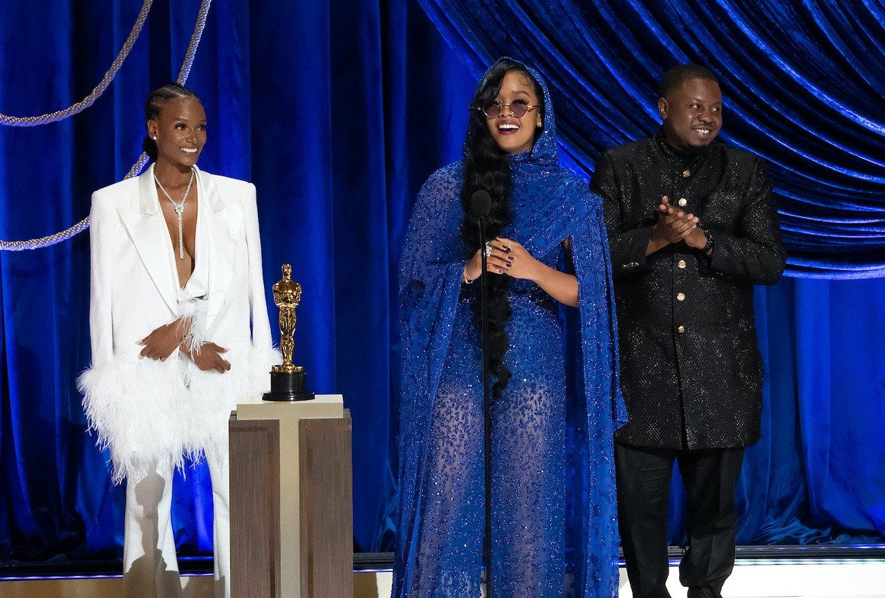 Photo of Tiara Thomas, H.E.R. and Dernst Emile II accepting the Oscar for Best Original Song at the 2021 Oscars
