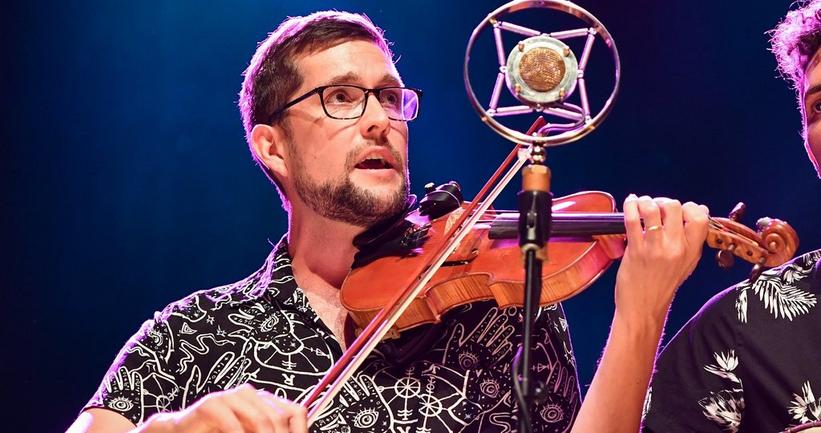 Joe Troop Of Che Apalache Talks New Video Series "Pickin' For Progress" & Being Queer In Bluegrass
