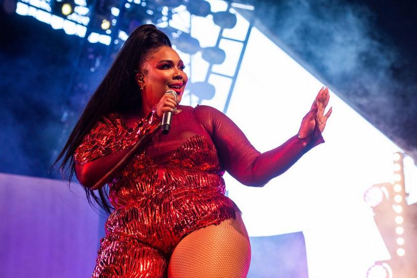 Lizzo proudly shows off her figure as she announces launch of new