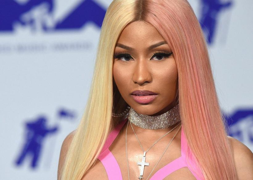 Nicki Minaj pulled a Lil' Kim and hit Fashion Week with one boob