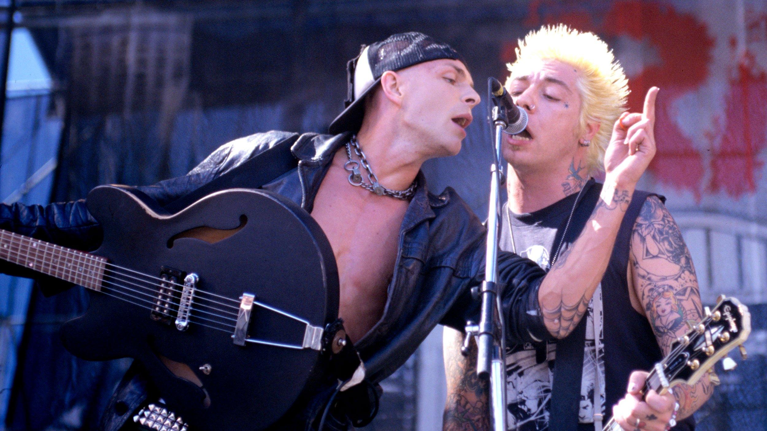 Tim Armstrong and Lars Fredricksen of Rancid perform at Lollapalooza in 1996.