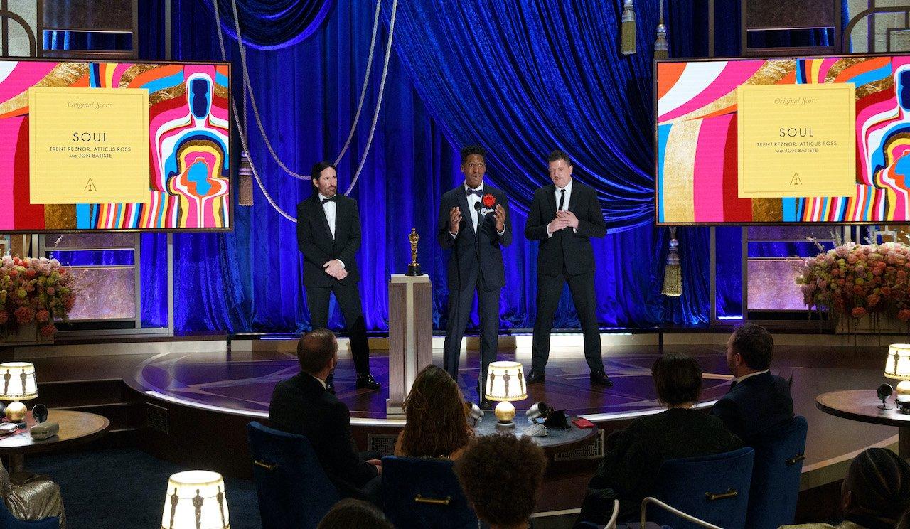 Photo of  (L-R) Trent Reznor, Jon Batiste, and Atticus Ross accepting the Music (Original Score) award for 'Soul' at the 2021 Oscars