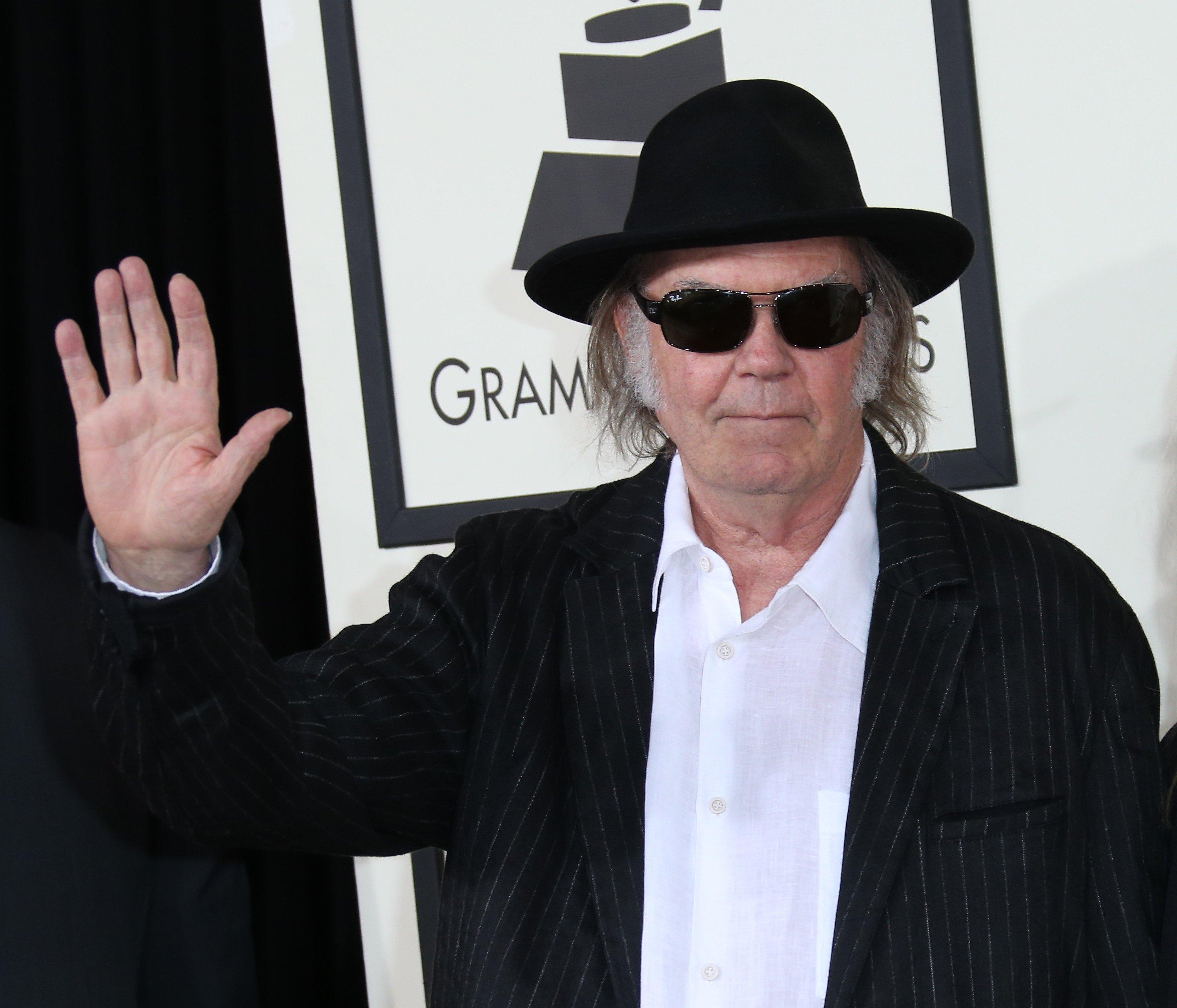 Neil Young arrives to the 56th GRAMMYs in 2014