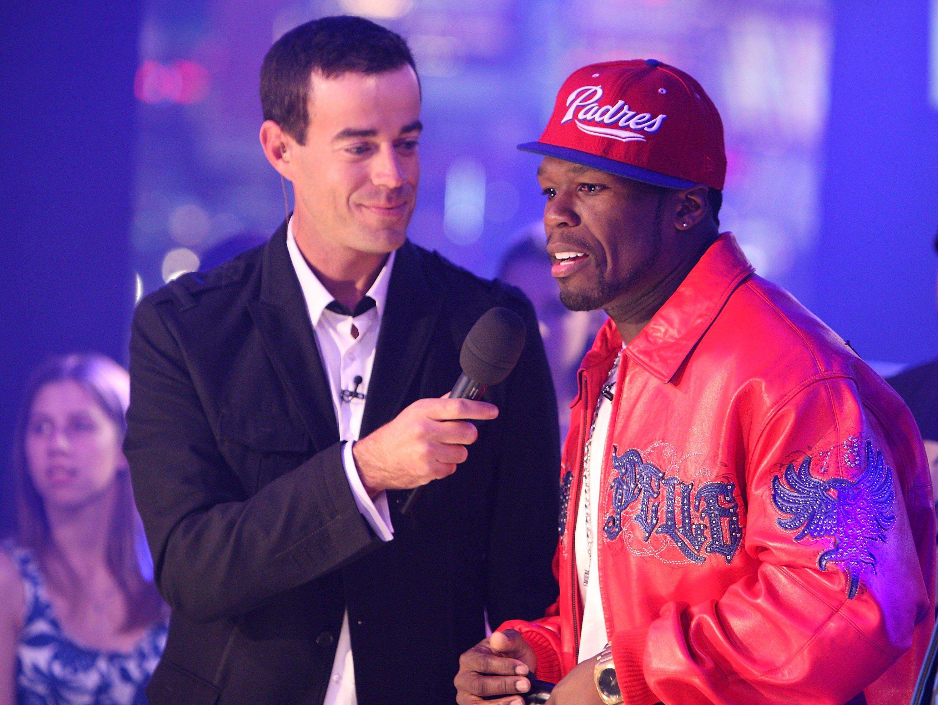 Carson Daly and 50 Cent on "TRL" set in 2008