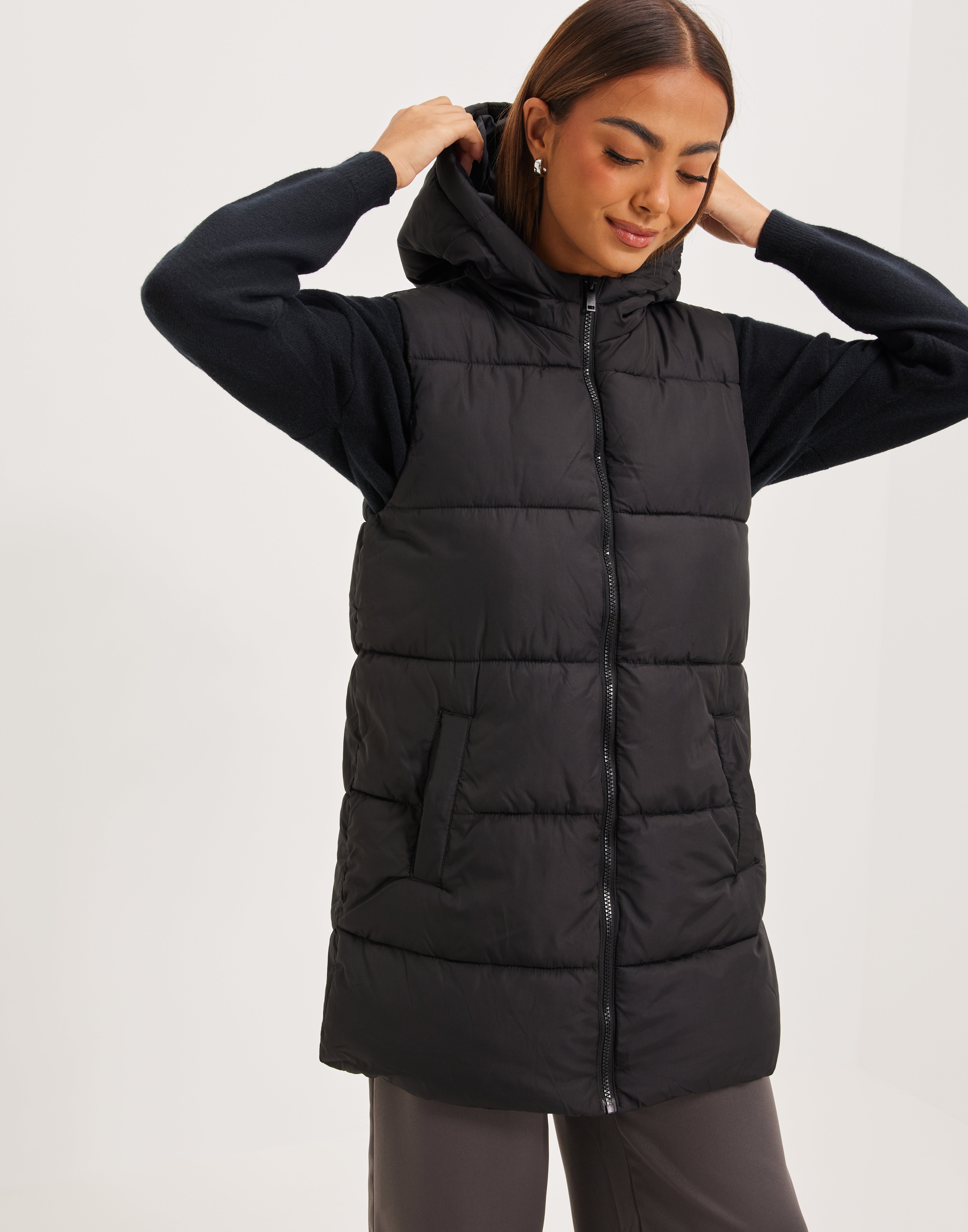 womens shiny black puffer vest