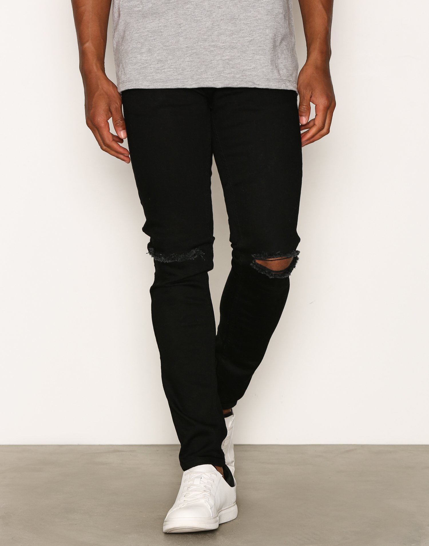 black knee ripped jeans mens