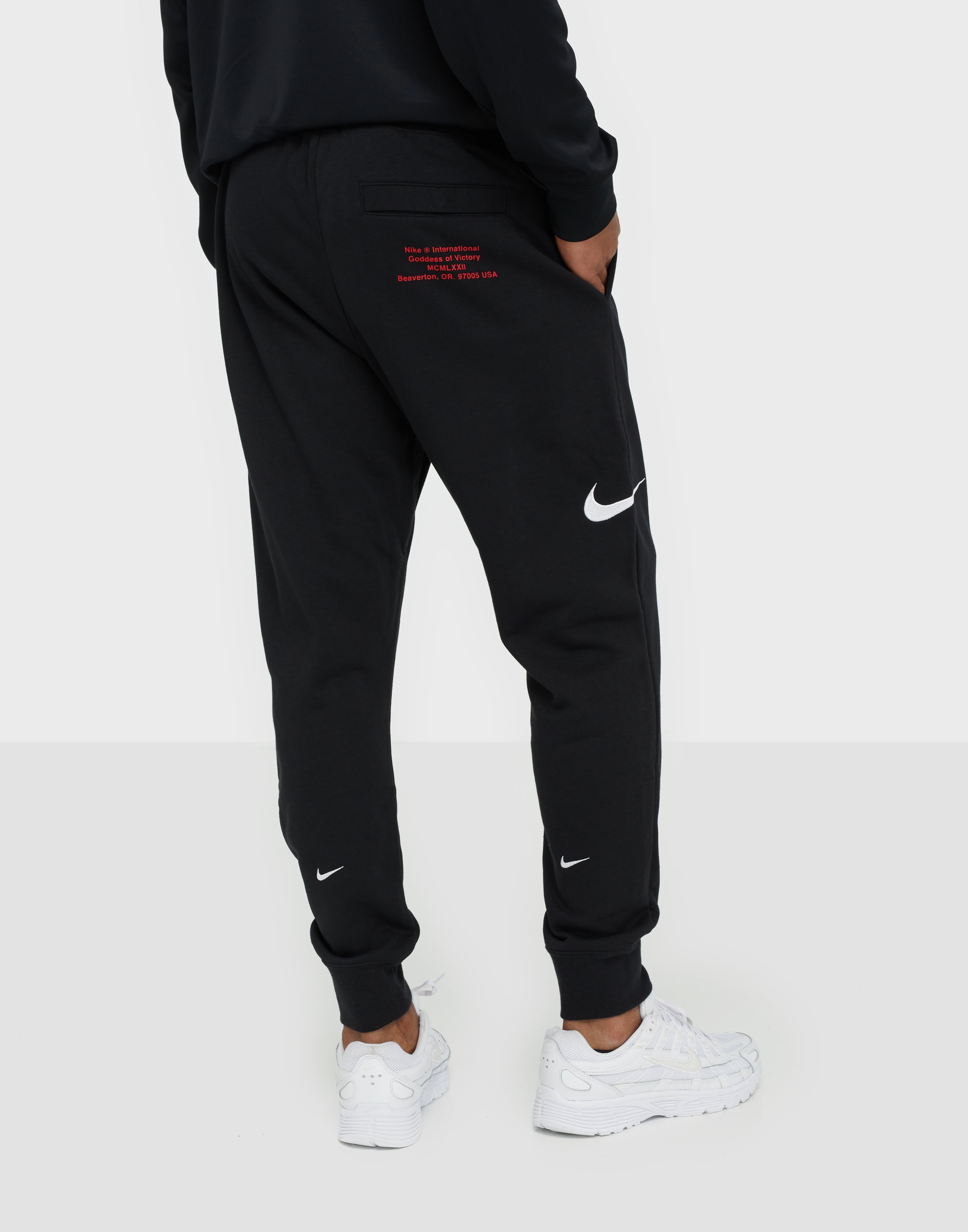 nike international pants