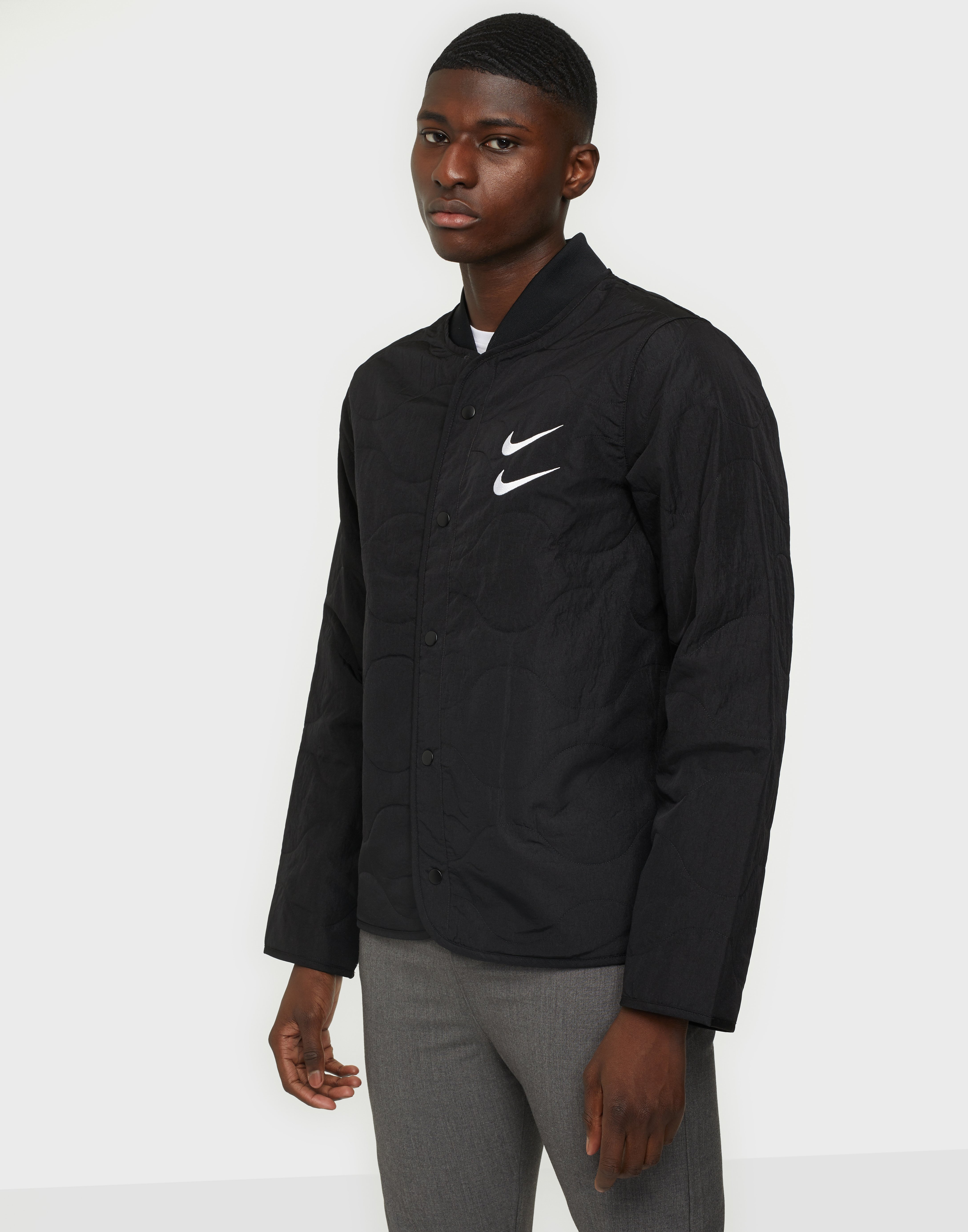 nike swoosh quilted jacket