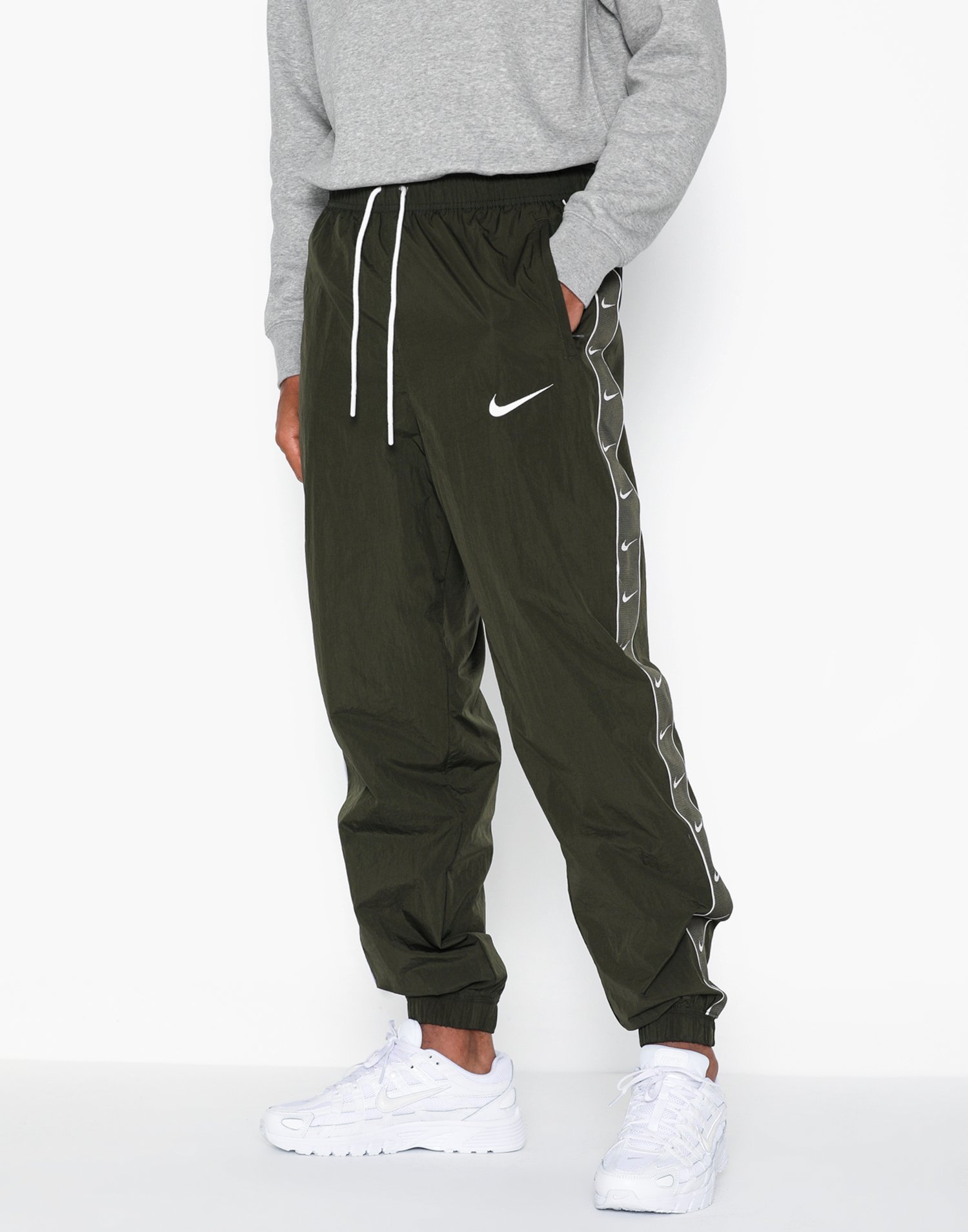 nike woven pants swoosh