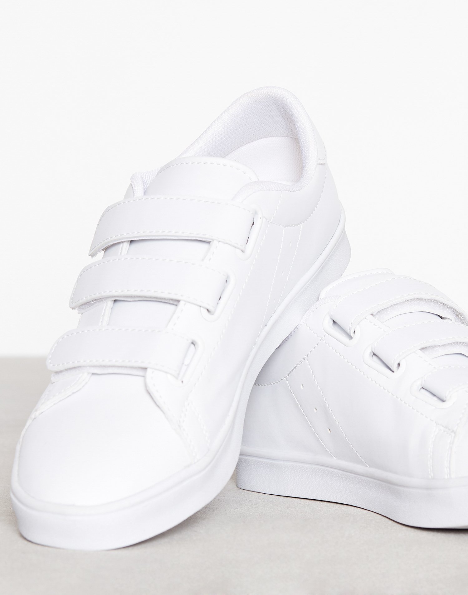 white velcro sneakers