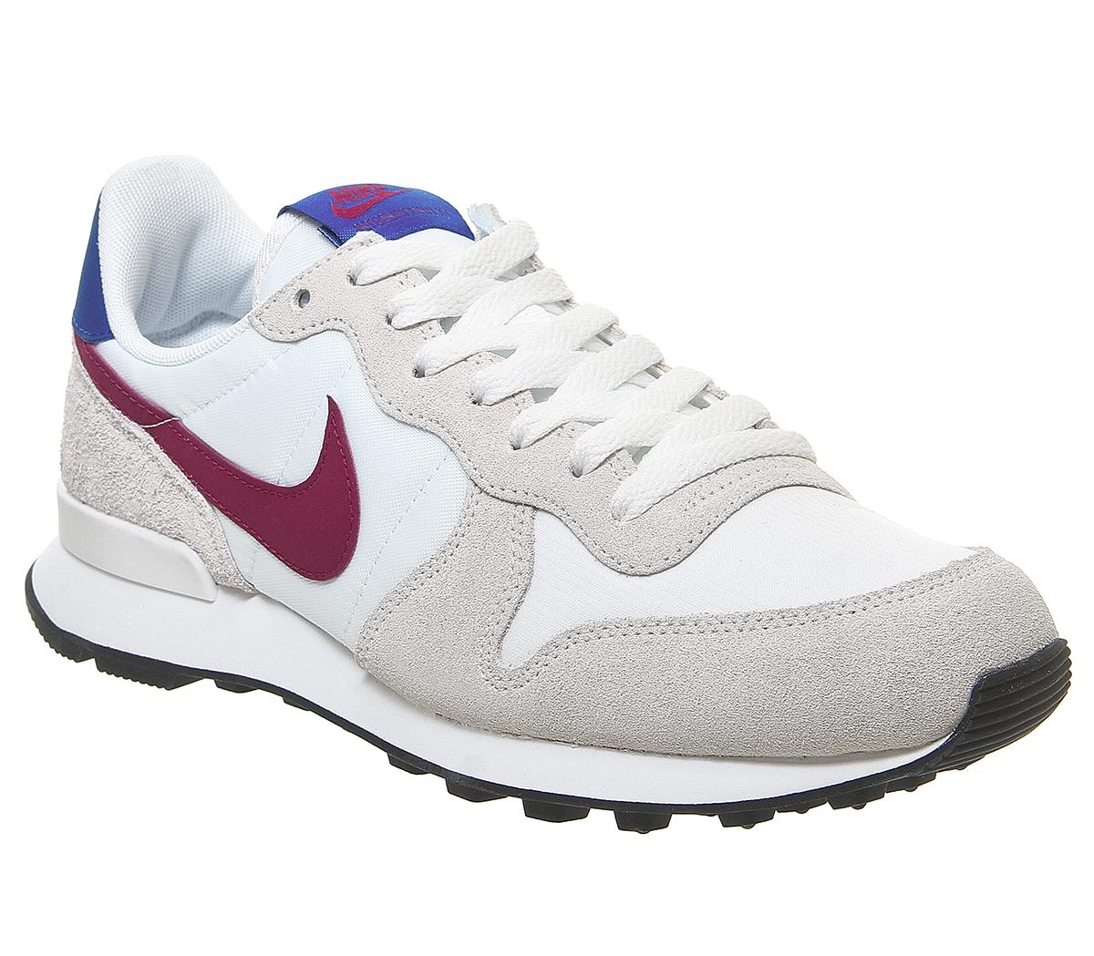 red white and blue nike trainers