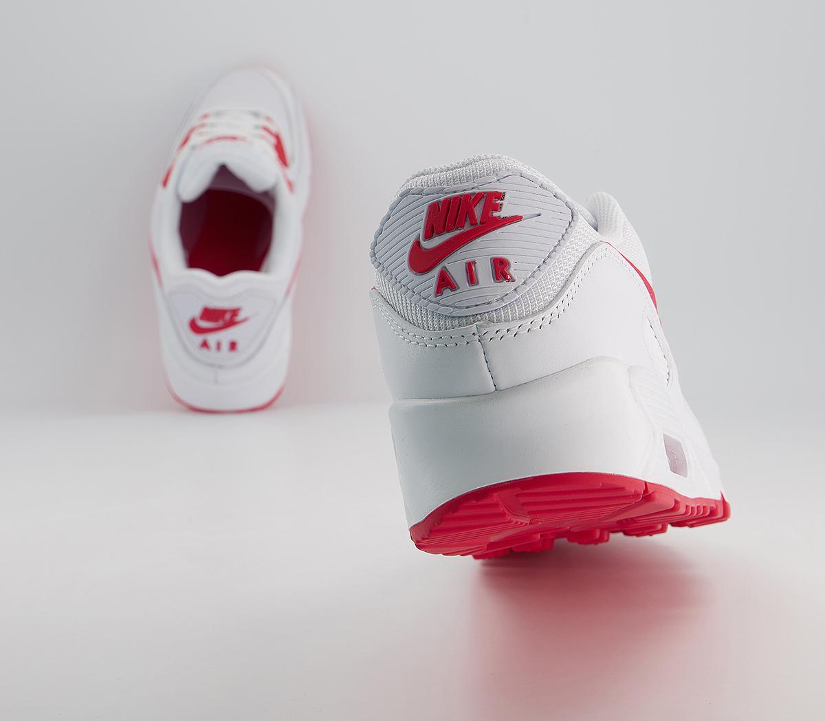 white nikes with red stripe
