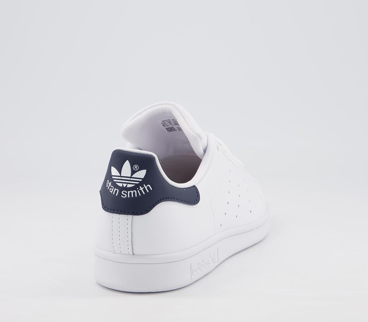 white and blue stan smiths