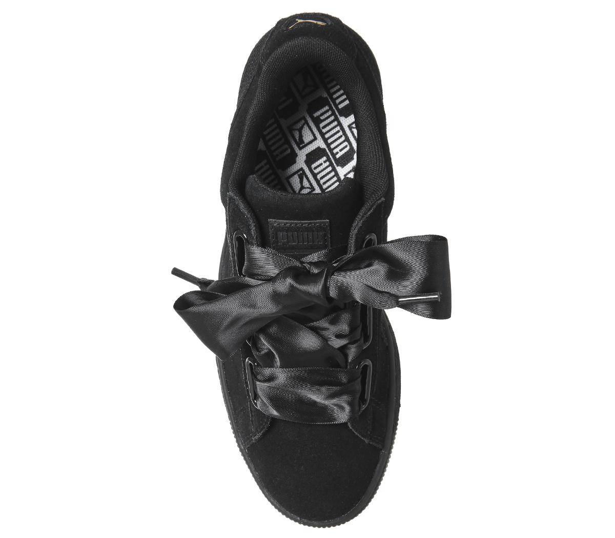 black trainers with bow