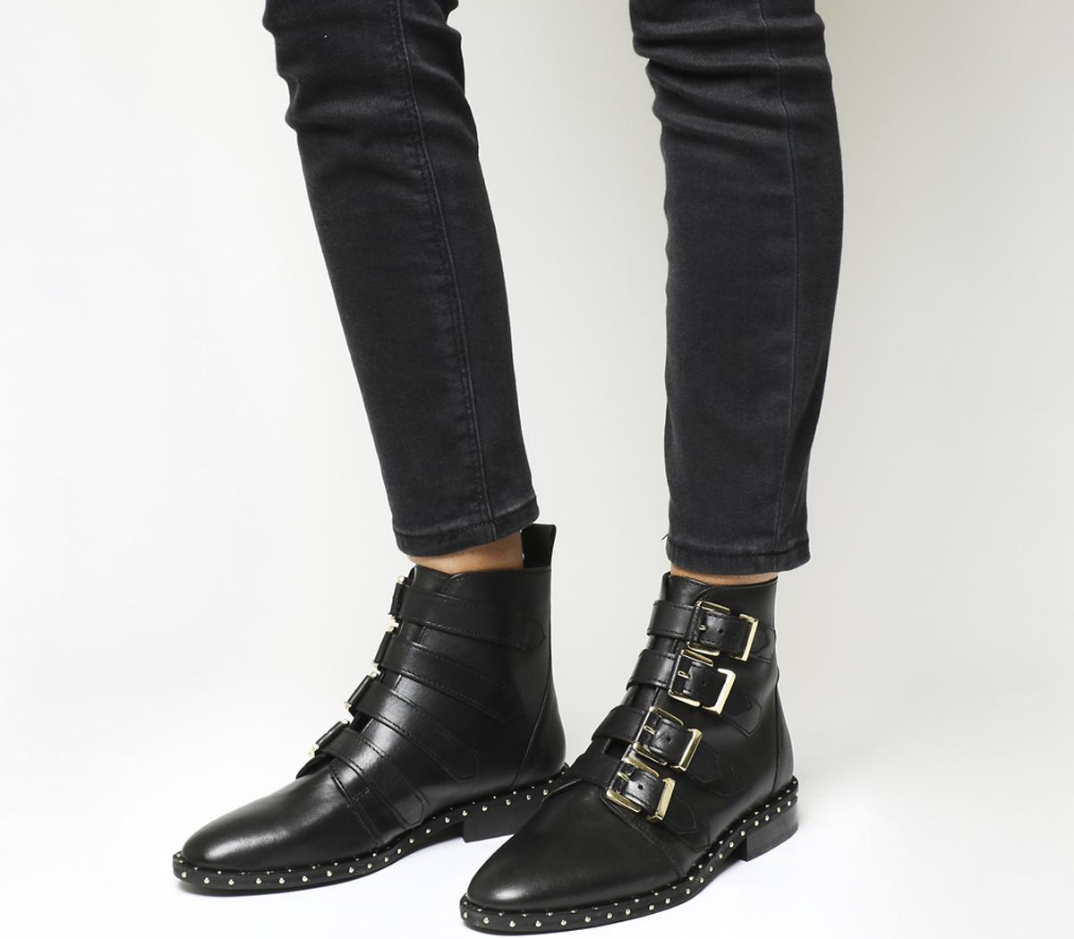 black leather boots with buckles