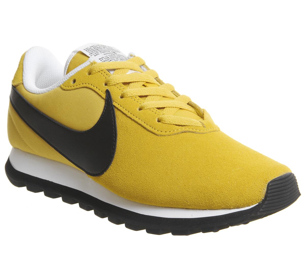 black and yellow nike trainers