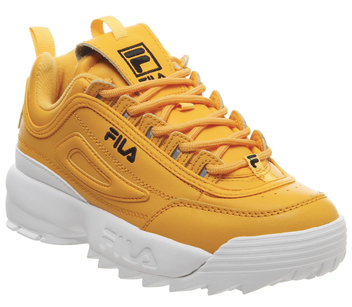 black and gold fila trainers