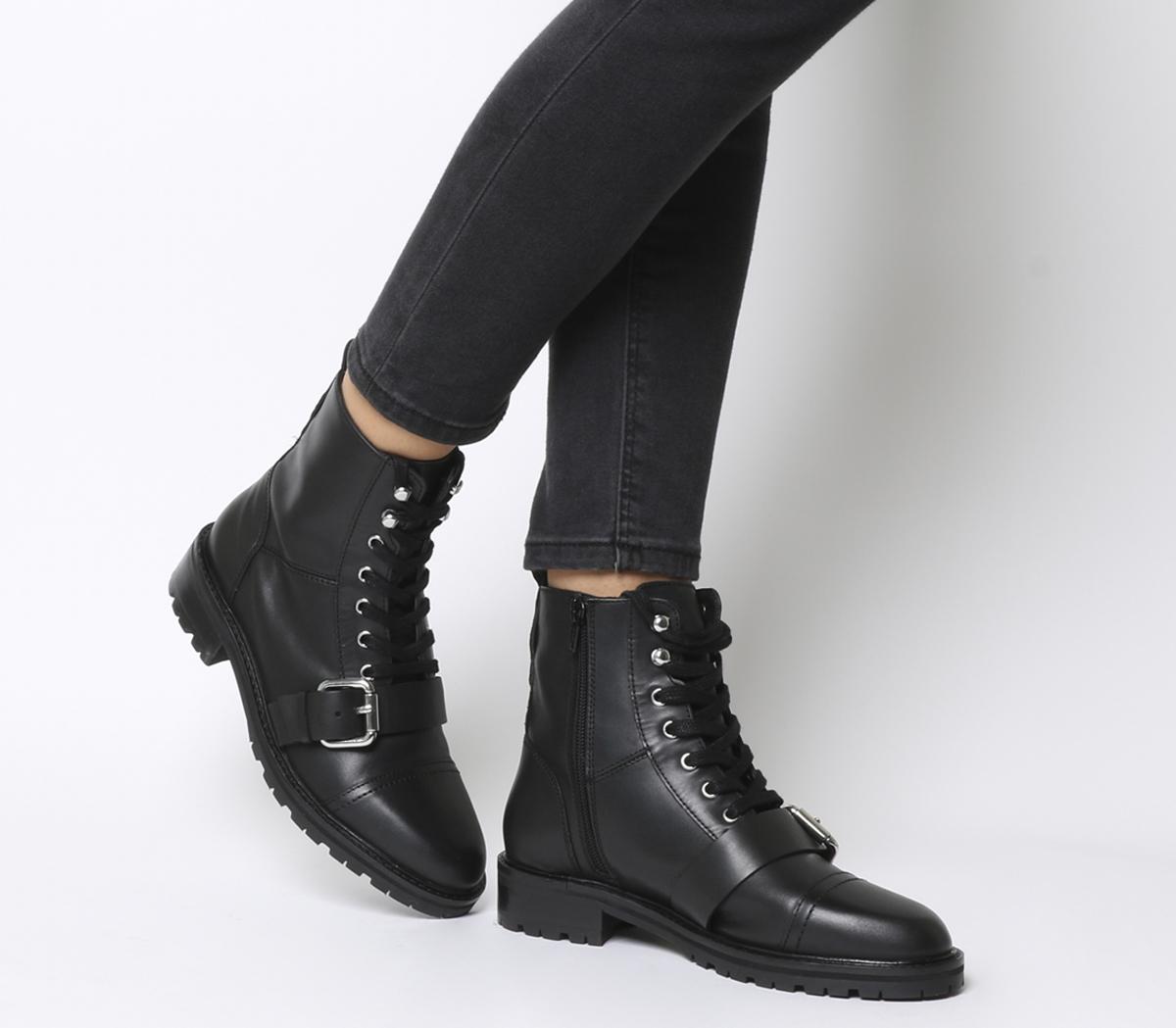 black heeled buckle boots