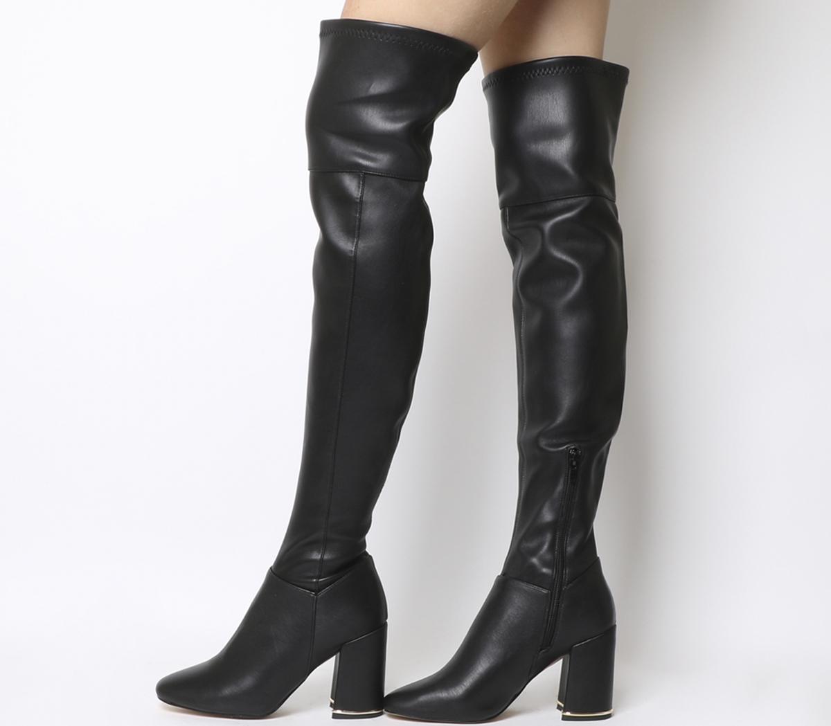 over the knee heeled boots