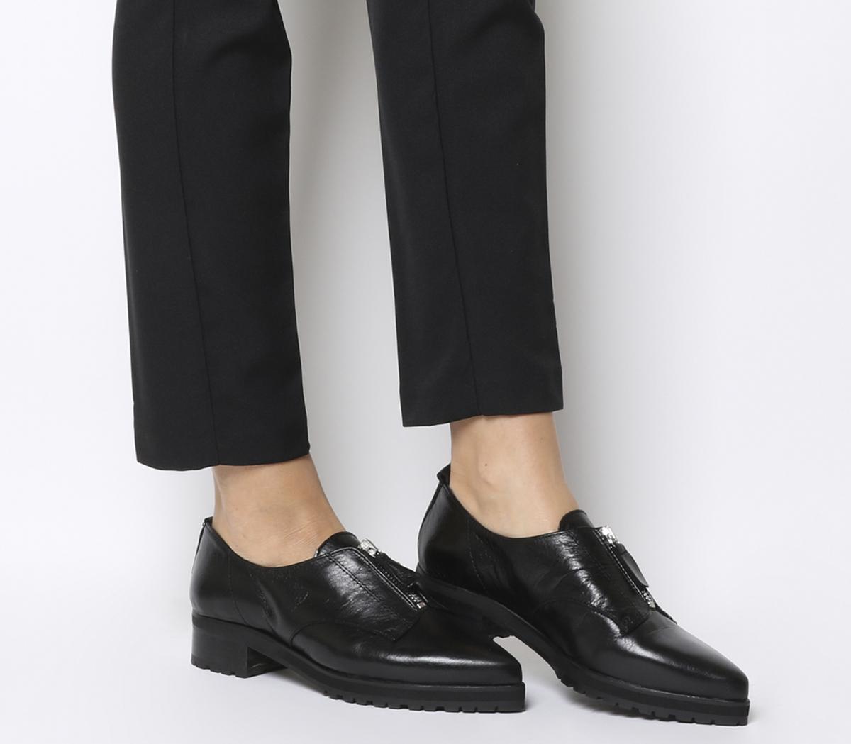 black leather flat shoes