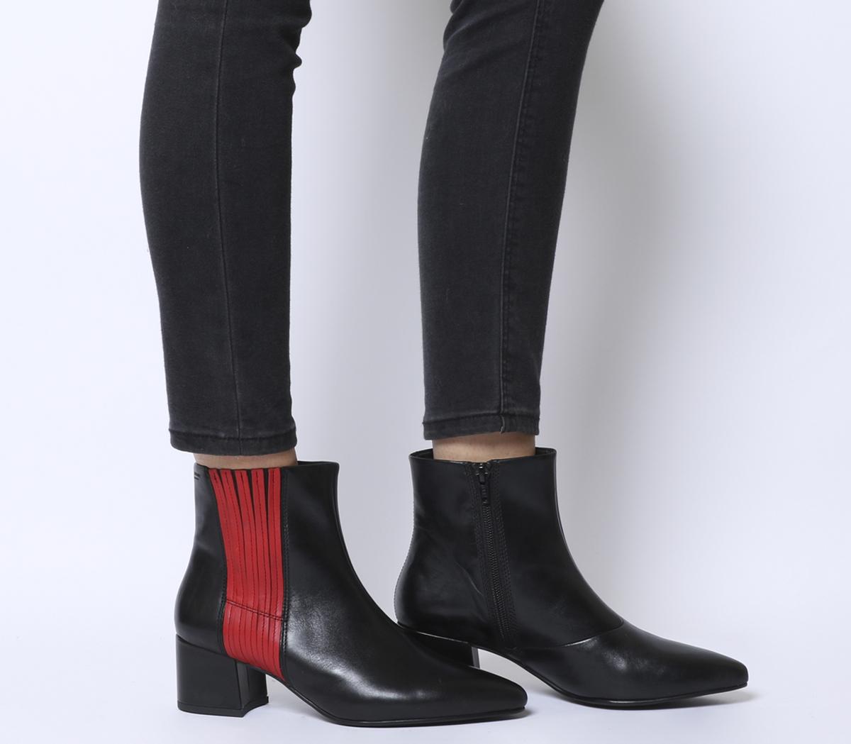 black boots with red stripe