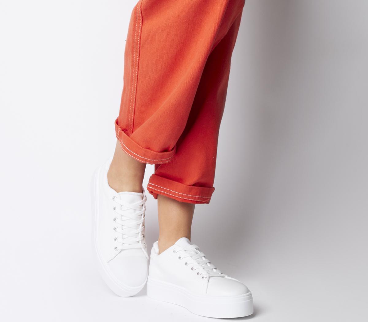 white canvas lace up trainers
