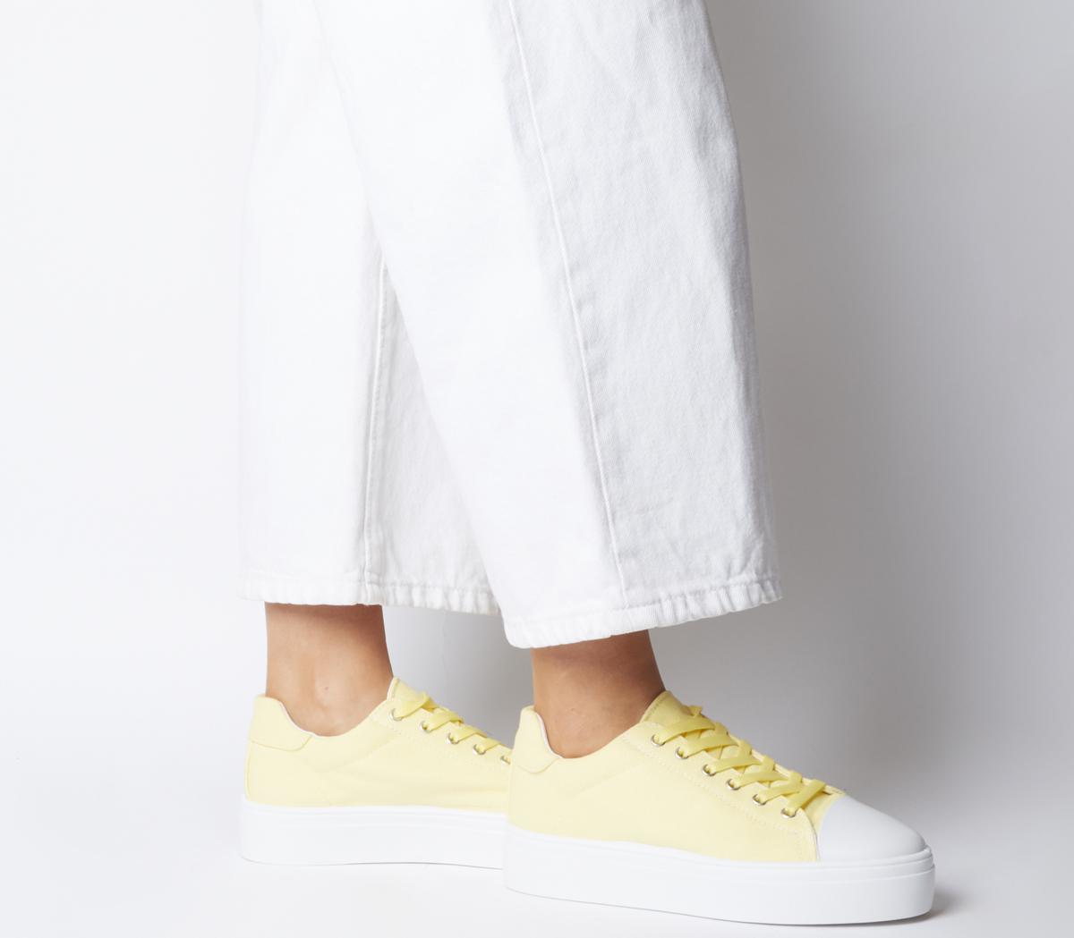yellow canvas trainers