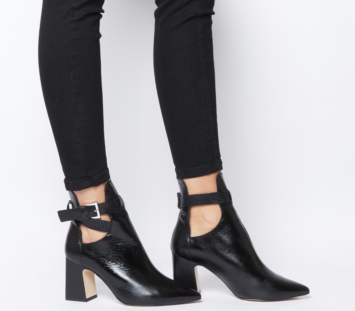black flared heel boots