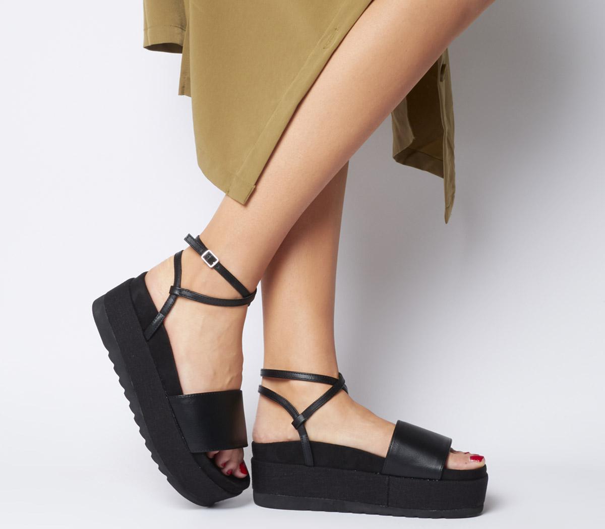 black flats with strap around ankle