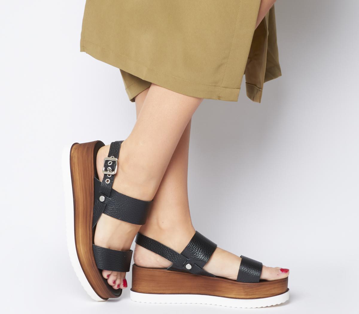black leather flatforms