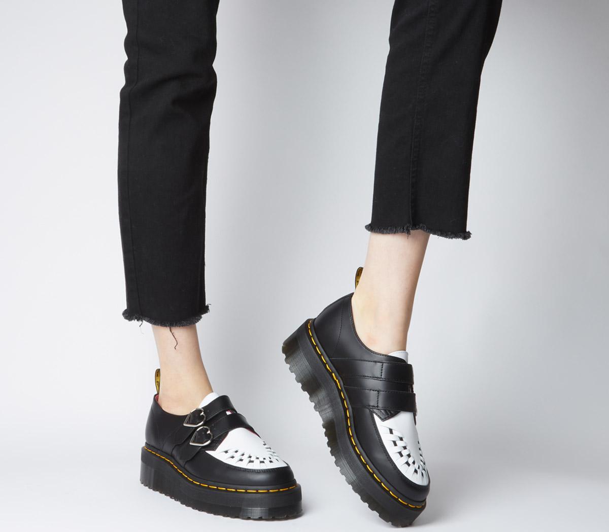 doc martens black and white shoes